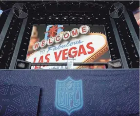  ?? STEVE LUCIANO/AP ?? Players strolled across the stage Thursday night at the NFL Draft Theater in Las Vegas.