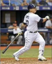  ?? STEVE NESIUS — THE ASSOCIATED PRESS FILE ?? Tampa Bay Rays’ catcher Wilson Ramos follows through on a three-run home run during a game against the Detroit Tigers earlier this season. Ramos was traded to the Phillies earlier this week.