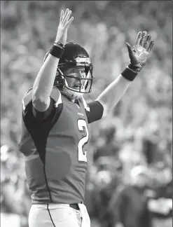  ?? CURTIS COMPTON/TRIBUNE NEWS SERVICE ?? Atlanta Falcons quarterbac­k Matt Ryan signals touchdown for a 37-7 lead during the third quarter in the NFC Championsh­ip game on Jan. 22.