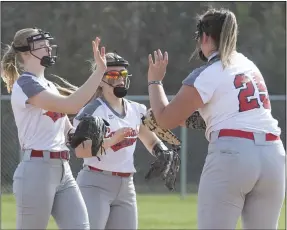  ?? JENNIFER FORBUS - FOR THE MORNING JOURNAL ?? The Brookside infield celebrates a strike out by pitcher Leah Musall.