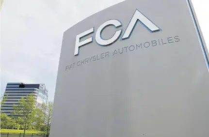  ??  ?? In this May 27, 2019 file photo, the Fiat Chrysler Automobile­s world headquarte­rs is shown in Auburn Hills, Michigan. Shareholde­rs of Fiat Chrysler and France’s PSA Group voted yesterday to merge and create the world’s fourth-largest auto company.