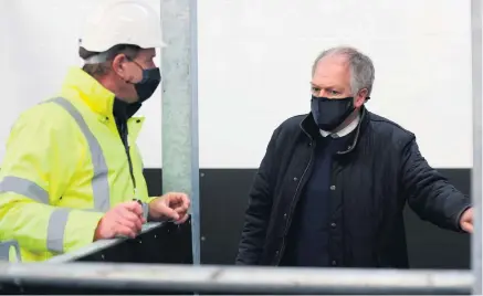  ?? PA ?? Changes: Northern Ireland’s Chief Veterinary Officer, Dr Robert Huey (right), during a visit to view the progress on the new Point of Entry facilities at Duncrue Industrial Estate, Belfast
