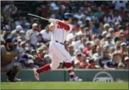  ?? STEVEN SENNE — ASSOCIATED PRESS ?? Red Sox’s Brock Holt delivers a run-scoring single in the sixth inning of Sunday’s game against the Blue Jays at Fenway Park in Boston.