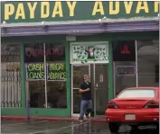  ?? LENNY IGNELZI — THE ASSOCIATED PRESS FILE ?? The exterior of a Payday Advance store is seen in Oceanside in 2006.