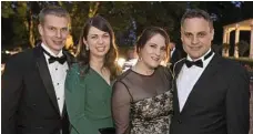  ??  ?? All dressed up for the Voyage a Paris gala ball are Elliott and Claire Hass (left) with Kristy and Darren Fielder.