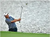  ??  ?? New Zealand’s Ryan Fox, top, had a mixed day but stayed in contention for a top-10 finish at the PGA championsh­ip where American Kevin Kisner, below, got out of some tricky spots to maintain his lead.