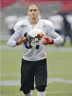  ?? ARLEN REDEKOP ?? Marco Iannuzzi, who wore a special helmet due to a concussion, says the CFL is making progress on head-injury issues.