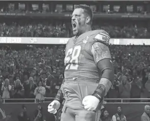  ?? JUNFU HAN/DETROIT FREE PRESS ?? Lions offensive tackle Taylor Decker takes the field during introducti­on before a game against the Panthers at Ford Field in Detroit on Oct. 8.