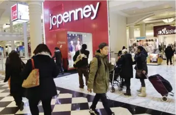  ?? MARK LENNIHAN/THE ASSOCIATED PRESS FILE PHOTO ?? J.C. Penney and other stores are preparing for the holiday season by offering exclusive in-store products and deals.