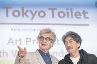  ?? ?? German director Wim Wenders, left, and Japanese actor Koji Yakusho at ‘The Tokyo Toilet Art Project With Wim Wenders’ event in Tokyo, on Wednesday.