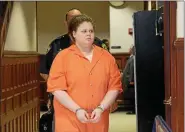  ?? TANIA BARRICKLO — DAILY FREEMAN FILE ?? Sarra Gilbert is led into the waiting area outside of the courtroom in the Ulster County Courthouse in Kingston, N.Y., before her sentencing on Friday, Aug. 4, 2017, for the murder of her mother, Mari Gilbert.