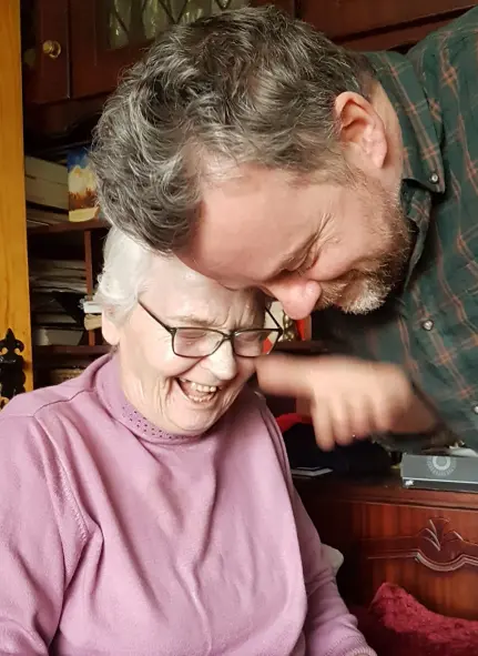  ??  ?? MOVED BY HER GREAT PERSONAL DIGNITY: Jody Corcoran with his mother Susan, who died last December