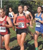  ?? MSOE ?? MSOE cross country and track athlete Alex Muench (center) will compete on the school’s triathlon team.