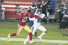  ?? JED JACOBSOHN — THE ASSOCIATED PRESS ?? Eagles wide receiver Travis Fulgham, right, catches a touchdown pass in front of 49ers’ cornerback Dontae Johnson Sunday night at Levi’s Stadium.