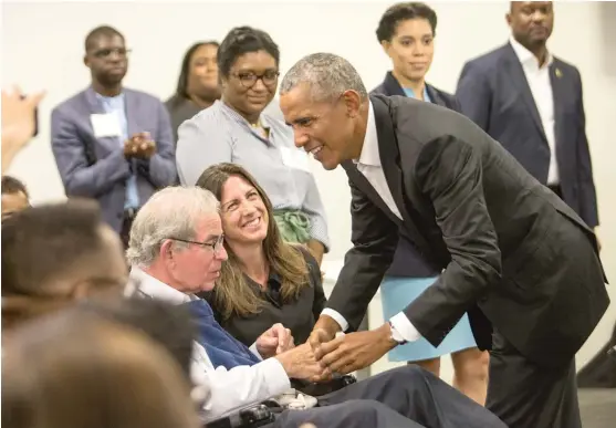  ?? ASHLEE REZIN/SUN-TIMES ?? Former President Barack Obama meets with stakeholde­rs and community members on Tuesday at the Obama Foundation’s headquarte­rs in Hyde Park.