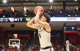  ?? DAVID JABLONSKI / STAFF ?? UD’S Koby Brea makes a 3-pointer against Davidson on Feb. 27 at UD Arena. Brea led the nation in 3-point shooting percentage last season (100 of 201, 49.8%).