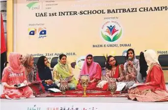  ?? Virendra Saklani/Gulf News ?? Students presenting a ‘mushaira’ before the UAE’s first Inter-School Bait Bazi Championsh­ip at Sharjah Children’s Reading Festival at Expo Centre Sharjah yesterday.