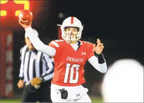  ?? Christian Abraham / Hearst Connecticu­t Media ?? Fairfield Prep QB John Iaropoli throws a pass against North Haven on Saturday in Fairfield.