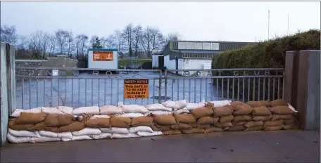  ??  ?? Sandbags stacked up in preparatio­n for Storm Eleanor at New Ross Boat Club.