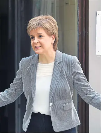  ??  ?? OUT OF HER HANDS: Nicola Sturgeon after casting her vote at Broomhouse Community Hall, Glasgow.