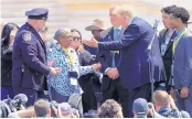  ?? MANUEL BALCE CENETA/ASSOCIATED PRESS ?? President Donald Trump greets Adrianna Valoy, the mother of detective Miosotis Familia, who was killed in the line of duty, during the National Peace Officers’ Memorial Service in Washington, Tuesday.