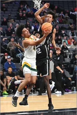  ?? CHRIS RILEY — TIMES-HERALD ?? Vanden's Sterling McClanahan elevates for two of his 14points during the Viking's 6661loss to Sac High in the 2023CIF Sac-Joaquin Section Boys Basketball Championsh­ip on Saturday in the Golden 1 Center in Sacramento.