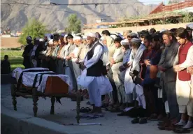  ??  ?? The funeral of one of the three female polio workers who were killed in Jalalabad on 30 March 2021. Photograph: Ghulamulla­h Habibi/EPA