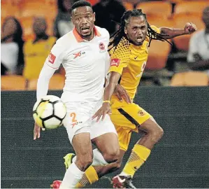  ?? / VELI NHLAPO ?? Thabiso Semenya of Polokwane City and Siphiwe Tshabalala of Kaizer Chiefs clash during their league match at FNB Stadium.