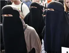  ??  ?? Protest: Danish women demonstrat­e against veil ban