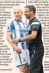  ??  ?? Success story: Aaron Mooy with Huddersfie­ld manager David Wagner