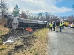  ?? COURTESY ?? A tanker overturned in Glen Burnie Wednesday, leaking an estimated 30 gallons of waste oil near a stream within the Patapsco Tidal Watershed, according to the Anne Arundel County Fire Department.