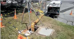  ??  ?? Above: A camera has been put down the damaged pipes on the corner of Adelaide Rd and Dover St in Island Bay. Wellington Water is having to truck millions of litres of sludge to the Southern Landfill because of the damage.