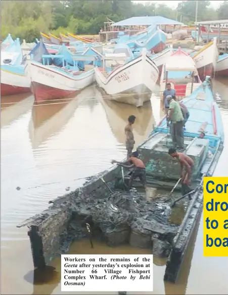  ?? (Photo by Bebi Complex Wharf. Oosman) ?? Workers on the remains of the Geeta
after yesterday’s explosion at Number 66 Village Fishport