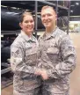  ?? CLAIRE GALOFARO/AP ?? Air National Guard members Lauren Durham, left, and Michael Davis at the Orange County Convention Center in Orlando, Fla.