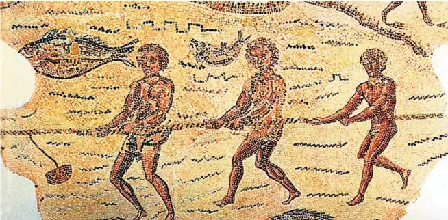  ?? ?? Jabegueros tirando de la jábega en un mosaico romano del siglo II d.c. (Museo del Bardo, Túnez).