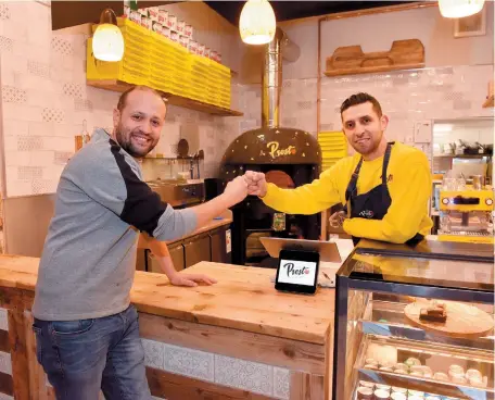  ?? ?? Hesham Fouda and Mo Fathy at the new Presto Italian takeaway in Bridge Street. Ref:1340924