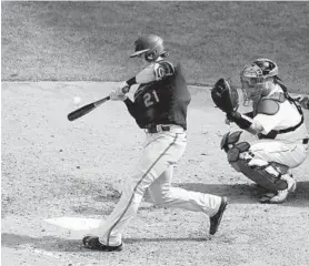  ?? STEVEN SENNE/AP ?? The Orioles’ Austin Hays swings at a pitch against the Red Sox on Sunday in Boston. Hays was the organizati­on’s top prospect at one point and made his debut in September 2017.