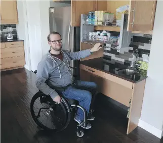  ?? J O H N L U C A S ?? A barrier- free kitchen is also key as mobility declines. Space under counters for wheelchair access and upper cabinets that can be pulled down make life easier in Joel Kleine’s Edmonton home.