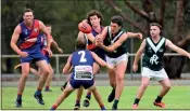  ?? PDFNL. Photo: Steve Huntley. ?? Pressure: Mathoura players converge on a Rennie opponent in round one of the