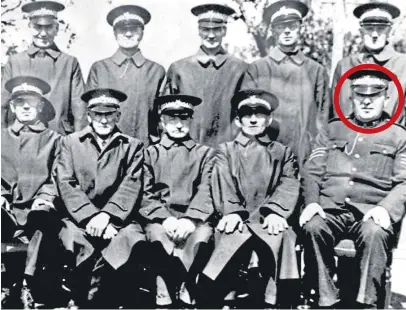  ??  ?? PC Sandy Marnoch, circled, and Oor Wullie creator Dudley D Watkins, back centre.