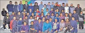  ??  ?? Croatian football experts pose with all the participan­ts at the end of the three-day special training programme of UP coaches in Lucknow on Sunday.