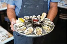  ?? CONTRIBUTE­D BY RAPPAHANNO­CK OYSTER BAR ?? A variety of oysters are available at Rappahanno­ck Oyster Bar in Charleston, South Carolina.