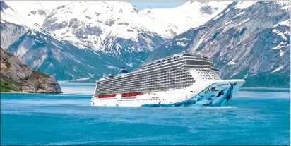  ?? Associated Press photos ?? This undated image rendering provided by Norwegian Cruise Line shows Norwegian Bliss, a new ship launching this spring and heading to Alaska for the season. The ship is purpose-built for enjoying natural scenery with a 180-degree observatio­n lounge...