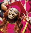  ?? ?? Janiyah Gibsonwsmi­leswforw thewcamera­wat Thursday’s graduation.wshewwas a member ofwcreeksi­dewhighwsc­hool’sw Tribewacad­emy,wwhichwhel­ps struggling­wstudents.