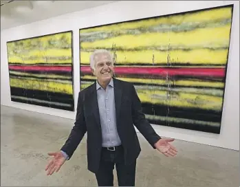  ?? Mel Melcon Los Angeles Times ?? MAURICE Marciano with a Sterling Ruby painting inside the Marciano Art Foundation. The center, started by Guess Inc. co-founders Maurice and Paul Marciano, opened with a big splash in spring 2017.