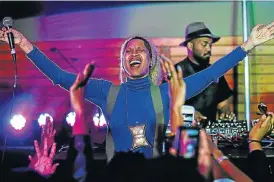  ?? /The Times ?? High on emotion: Queen of Neo Soul Erykah Badu, or rather her alter ego, DJ Lowdown Loretta Brown, headlined the Cape Town Internatio­nal Jazz Festival in 2014.