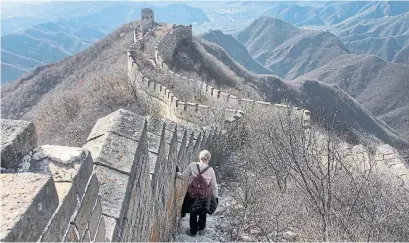  ?? ANNA HARTLEY FOR THE WASHINGTON POST ?? Most of the Ming Wall around Beijing is built on a foundation of cut stone and bricks held with an ancient, but strong, mortar.