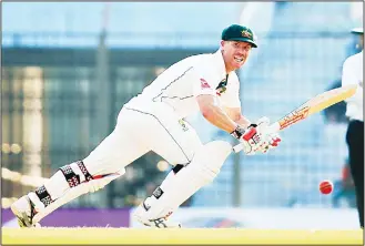  ??  ?? Australia’s David Warner plays a shot during the second day of their second Test cricket match against
Bangladesh in Chittagong, Bangladesh on Sept 5. (AP)