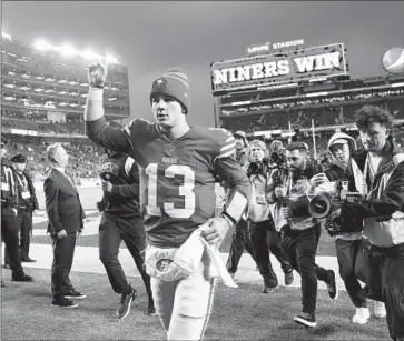  ?? Jed Jacobsohn Associated Press ?? BROCK PURDY showed no jitters in his playoff debut. “We’ve got a goal of winning the whole thing,” said Purdy, who threw for 332 yards and accounted for four touchdowns in the 49ers’ 41-23 win over the Seahawks.