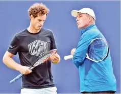  ?? — AFP photo ?? This file photo taken on June 14, 2016 shows Britain’s Andy Murray (L) speaking to then new Czech-US coach Ivan Lendl (R) during practice at the ATP Aegon Championsh­ips tennis tournament at the Queen’s Club in west London.